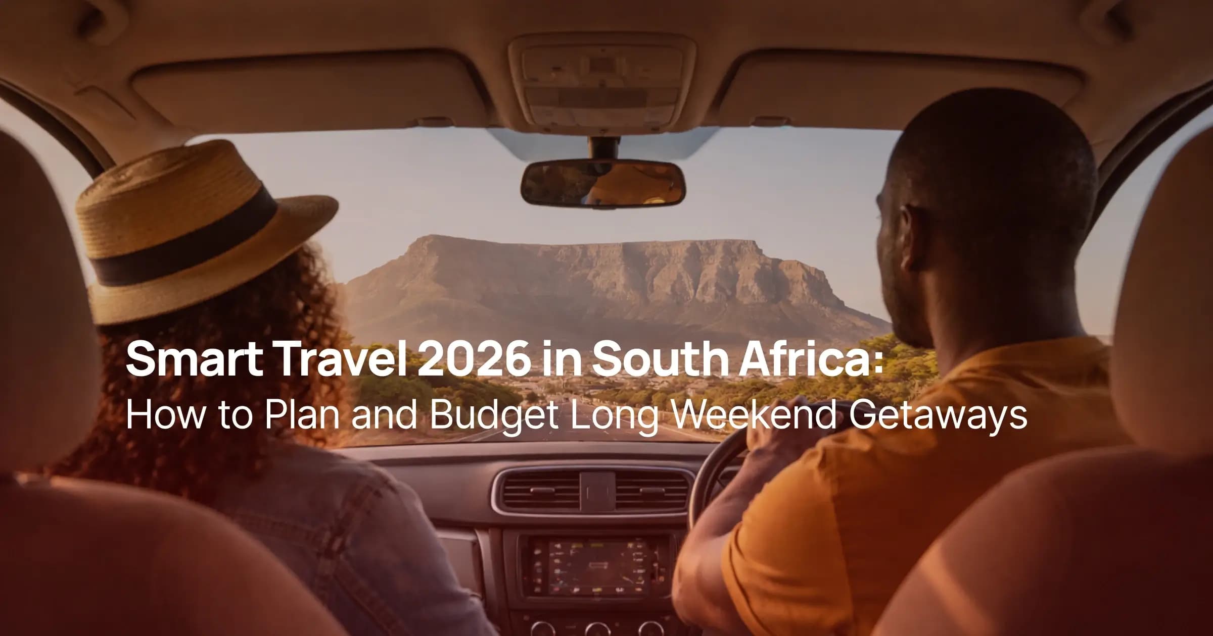 African couple on a road trip driving toward Table Mountain in Cape Town, South Africa